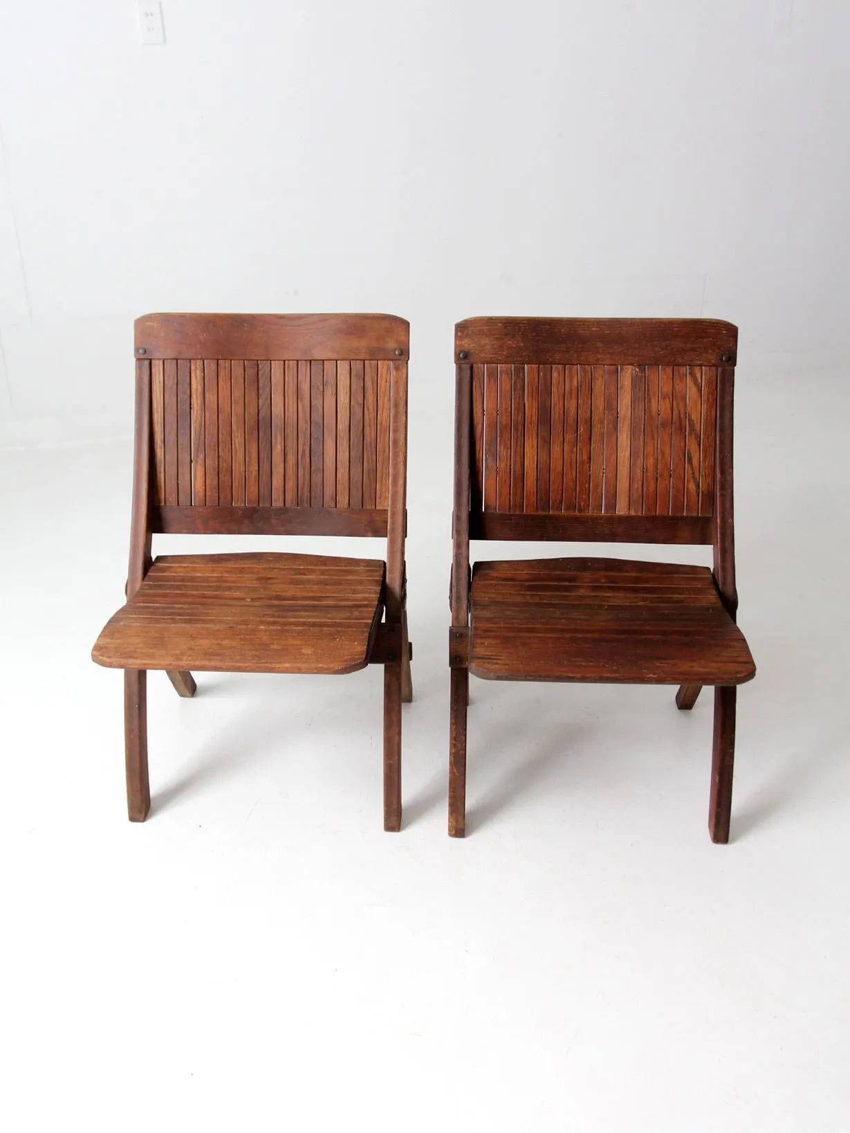 mid-century slat wood folding chairs pair